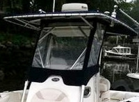 Photo of Boston Whaler Outrage 240, 2004: T-Top, Visor notched in, Front Side Curtains, viewed from Port Front 