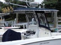 Photo of Boston Whaler Outrage 240 2004: T-Top, Visor, Side Curtains Seat Covers, viewed from Starboard Rear 