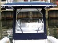 Photo of Boston Whaler Outrage 240, 2004: T-Top, Visor, Side Curtains, Front 