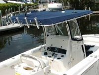 Photo of Boston Whaler Outrage 240, 2005: Factory OEM T-Top, Front Visor open, Side Curtains, viewed from Starboard Rear 