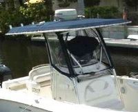 Photo of Boston Whaler Outrage 240, 2005: Factory OEM T-Top, Front Visor rolled down Side Curtains, viewed from Starboard Front 