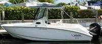 Photo of Boston Whaler Outrage 240 2005: Factory OEM T-Top, Front Visor, Side Curtains, viewed from Port Side 