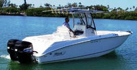 Photo of Boston Whaler Outrage 270, 2004: Factory OEM Sunbrella T-Top, Visor T-Top Enclosure Curtains, viewed from Starboard Rear 