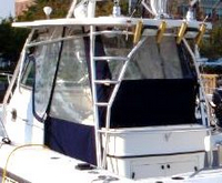 Photo of Boston Whaler Outrage 28, 2000: Hard-Top, Visor, Side Curtains, Aft-Drop-Curtain, viewed from Port Rear 