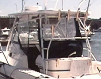 Photo of Boston Whaler Outrage 28 2001: Hard-Top, Visor, Side Curtains, Aft-Drop-Curtain, viewed from Port Rear 