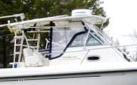 Photo of Boston Whaler Outrage 290, 2003: Hard-Top, Visor, Side Curtains, Aft-Drop-Curtain, viewed from Starboard Side 