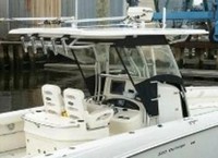 Photo of Boston Whaler Outrage 320 Center Console, 2005: Hard-Top, Visor, Side Curtains, viewed from Starboard Rear 