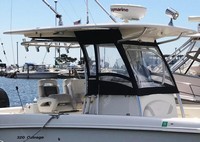 Photo of Boston Whaler Outrage 320 Center Console, 2008: Hard-T-Top, Visor, Side Curtains, viewed from Starboard Front 