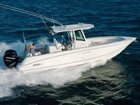Photo of Boston Whaler Outrage 320 Center Console, 2011: (Factory OEM website photo), viewed from Starboard Side 