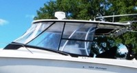 Photo of Boston Whaler Outrage 320 Cuddy, 2006: Hard-Top, Visor, Side Curtains, viewed from Port Side 