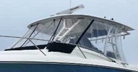 Photo of Boston Whaler Outrage 320 Cuddy, 2011: Hard-Top, Visor, Side Curtains, viewed from Port Front 