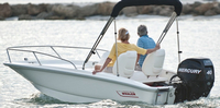 Photo of Boston Whaler Super Sport 130, 2014: Sun Top, Bimini Top in Boot, viewed from Port Rear 