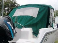 Photo of Boston Whaler Ventura 18 2000: Bimini Top, Side Curtains, Aft Curtain zipped partially open, viewed from Starboard Rear 