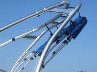 Bimini-Top-Under-Tower-Carver™Carver(r) Ready-to-Assemble Universal Tower Bimini Top in 4 sizes to fit virtually any tower configuration. Carver(r) has over 30 years of experience building Bimini-Tops and Boat-Covers.