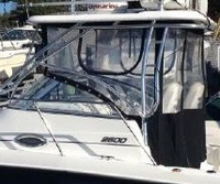 Photo of Century 2600WA, 2007: Hard-Top, Front Connector, Side Curtains, Aft-Drop-Curtain, viewed from Port Rear 