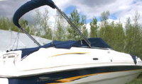 Photo of Chaparral 233 Sunesta, 2002: Bimini Top in Boot, Bow Cover Cockpit Cover, viewed from Starboard Rear 