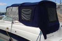 Photo of Chaparral 240 Signature, 1999: Bimini Top, Connector, Side Curtains, Camper Top, Camper Side and Aft Curtains, viewed from Port Rear 
