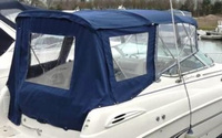 Photo of Chaparral 240 Signature, 2000: Bimini Top, Front Connector, Side Curtains, Camper Top, Camper Side and Aft Curtains, viewed from Starboard Rear 