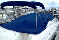 Photo of Chaparral 260 Signature, 2002: Bimini Top in Boot, Camper Top in Boot, Cockpit Cover, viewed from Starboard Rear 