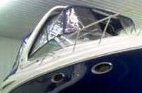 Photo of Chaparral 310 Signature, 2004: Bimini Top, Connector, Side Curtains, Camper Top, Camper Side and Aft Curtains blue, viewed from Starboard Front 