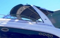 Photo of Chaparral 350 Signature Arch, 2006: Bimini Top, Front Connector, Side Curtains, Camper Top, Camper Side and Aft Curtains Blue, viewed from Port Side 