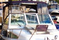 Photo of Chris Craft Constellation 26, 2003: Bimini Top, Front Connector, Side Curtains, viewed from Starboard Front 