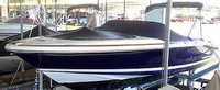 Photo of Chris Craft Launch 25, 2003: Bimini Top in Boot, Bow Cover Cockpit Cover, viewed from Port Front 