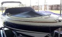 Photo of Chris Craft Launch 25, 2003: Bimini Top in Boot, Bow Cover Cockpit Cover, viewed from Starboard Front 
