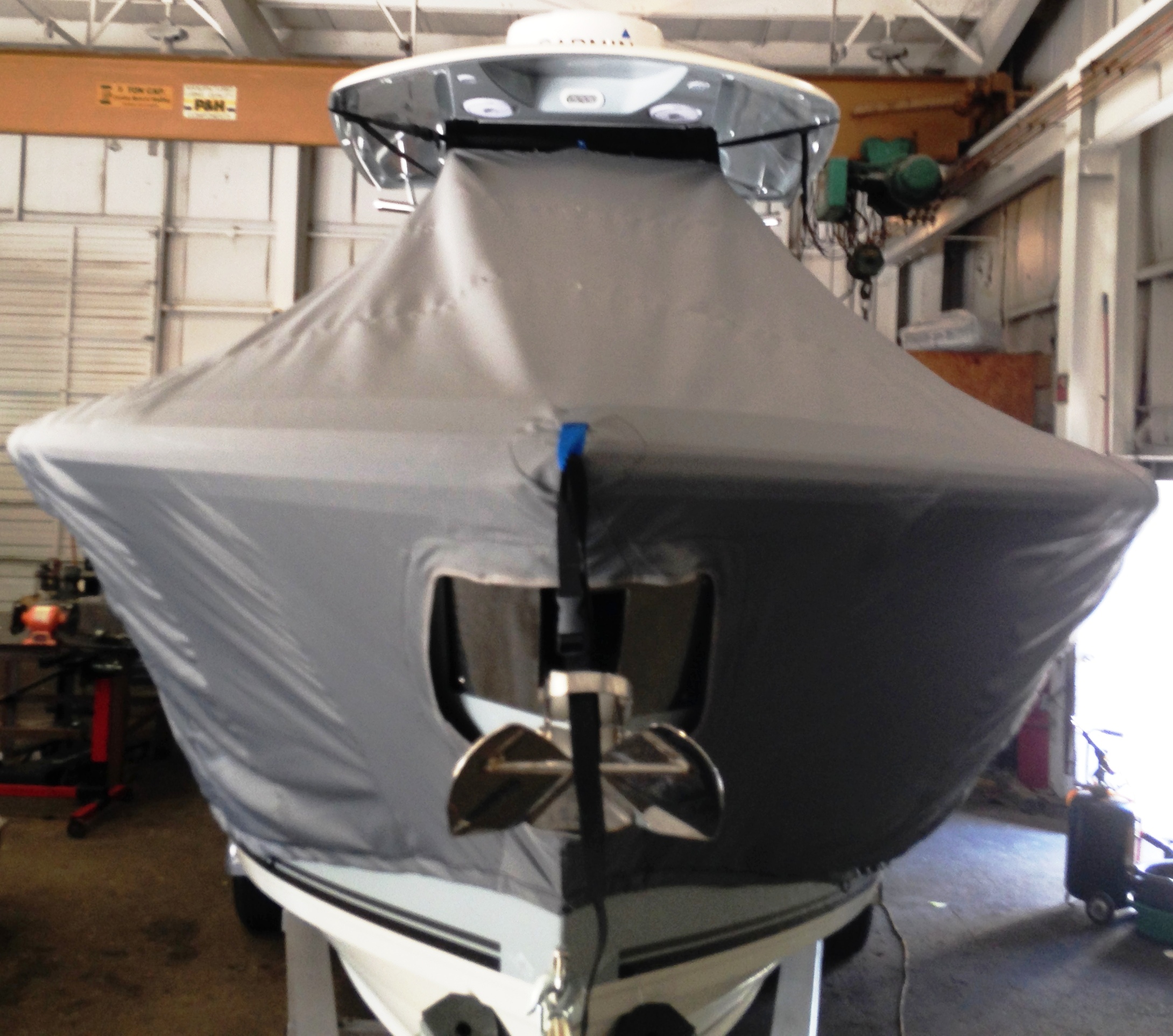Cobia 296CC, 20xx, TTopCovers™ T-Top boat cover front