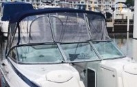Photo of Crownline 320 LS No Arch, 2006: Bimini Top frotn Connector, Side and Aft Curtains, viewed from Starboard Front 