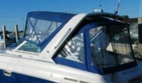Photo of Formula 27 PC, 2003: Bimini Top, Connector, Side Curtains, Camper Top, Camper Side and Aft Curtains, viewed from Port Rear 