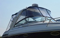 Photo of Formula 27 PC, 2007: Bimini Top, Front Connector, Side Curtains, Camper Top, Camper Side and Aft Curtains, viewed from Starboard Front 