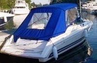 Photo of Formula 280 SS NO Arch, 1999: Bimini, Bimini Connector, Side Curtains, Camper Top, Camper Side and Aft Curtain, viewed from Starboard Rear 
