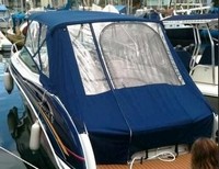 Photo of Formula 310 SS NO Arch, 2010: Bimini Top, Connector, Side Curtains, Camper Top, Camper Side and Aft Curtains, viewed from Port Rear 