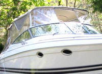 Photo of Formula 330 SS, 1999: Bimini Top, Connector, Side Curtains, Camper Top, Camper Side and Aft Curtains, viewed from Starboard Bow 