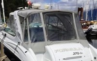 Photo of Formula 370 SS Stainless WindShield, 2005: Bimini Top, Side Curtains, Camper Top, Camper Side and Aft Curtains, viewed from Port Rear 