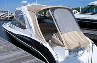 Photo of Formula 370 SS Stainless WindShield, 2014: Bimini Top, Connector, Side Curtains, Camper Top, Camper Side and Aft Curtains, Arch Connections, viewed from Port Rear 