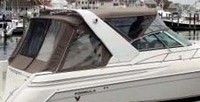 Photo of Formula 41 PC, 2001: Arch Bimini Top, Front Connector, Side Curtains, Camper Top, Camper Side and Aft Curtains, viewed from Starboard Rear 