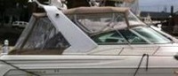 Photo of Formula 41 PC, 2001: Arch Bimini Top, Front Connector, Side Curtains, Camper Top, Camper Side and Aft Curtains, viewed from Starboard Side 