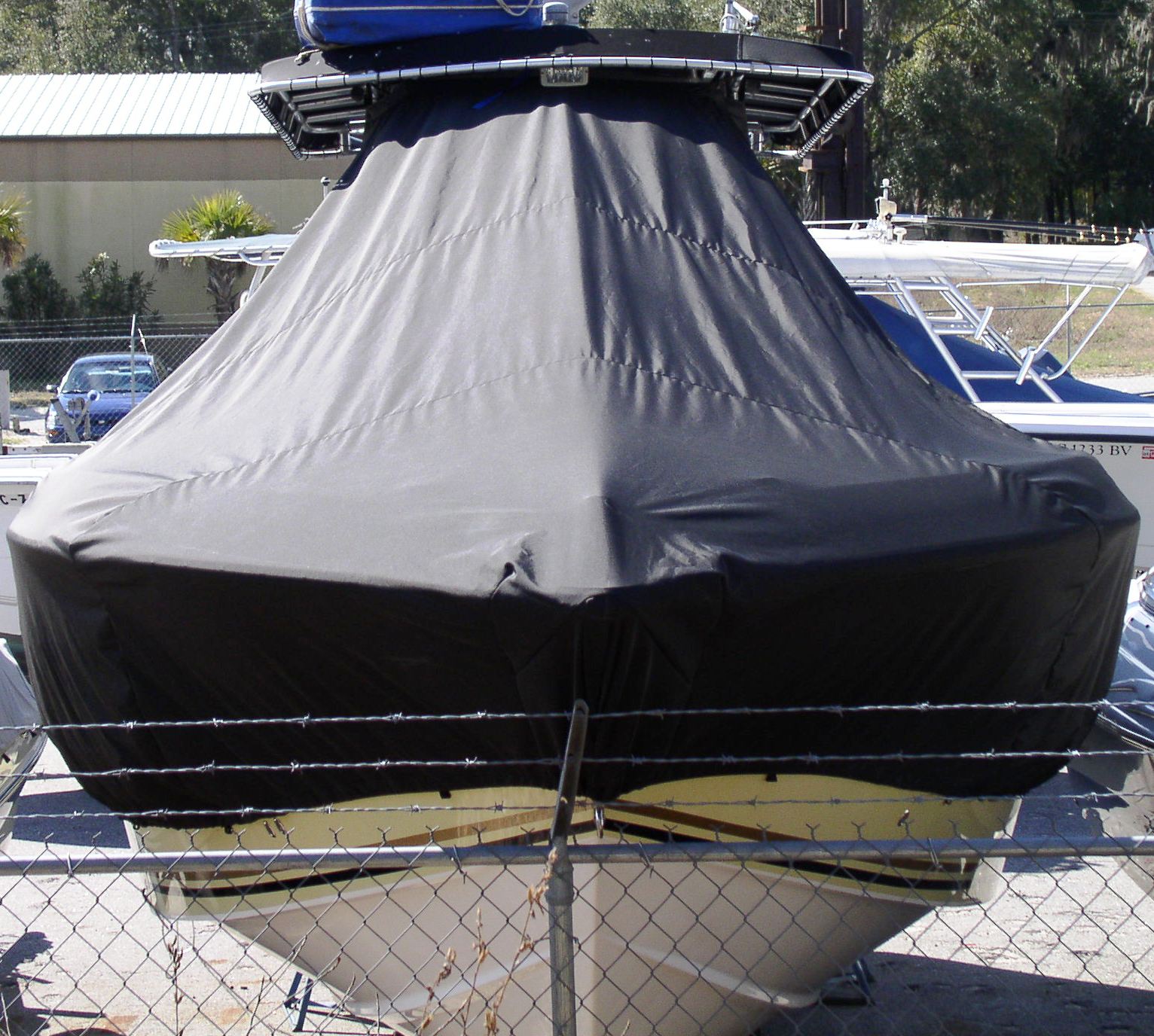 Fountain 32CC, 19xx, TTopCovers™ T-Top boat cover front