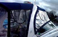 Photo of Four Winns V288 2009: Bimini Top, Front Visor, Side Curtains, Camper Top, Camper Side Curtains close up, viewed from Starboard Side 