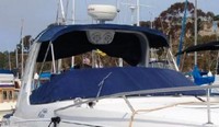 Photo of Four Winns Vista 268, 2004: Bimini Top, Cockpit Cover with Bimini Frame Cutouts, viewed from Starboard Front 