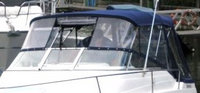 Photo of Glastron GS 249, 2000: Bimini Top, Connector, Side Curtains, Camper Top, Camper Side and Aft Curtains, viewed from Port Front 