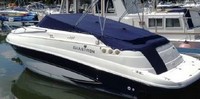 Photo of Glastron GS 259, 2006: No Arch Bimini Top in Boot, Cockpit Cover, viewed from Port Rear 