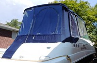 Photo of Glastron GS 259, 2006: No Arch Bimini Top, Front Connector, Side Curtains, Camper Top, Camper Side and Aft Curtains, viewed from Starboard Rear 