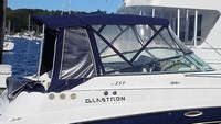 Photo of Glastron GS 259, 2006: No Arch Bimini Top, Front Connector, Side Curtains, Camper Top, Camper Side and Aft Curtains, viewed from Starboard Side 