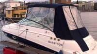 Photo of Glastron GS 269, 2006: Bimini Top, Front Connector, Side and Aft Curtains, viewed from Port Rear 