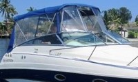 Photo of Glastron GS 269, 2006: Bimini Top, Front Connector, Side and Aft Curtains, viewed from Starboard Front 