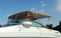 Photo of Glastron GS 279, 2004: Bimini Top, Front Connector, Side Curtains Beige Sunbrella, viewed from Port Front 