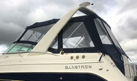 Photo of Glastron GS 279, 2006: Bimini Top, Front Connector, Side Curtains, Camper Top, Camper Side and Aft Curtains, viewed from Port Rear 